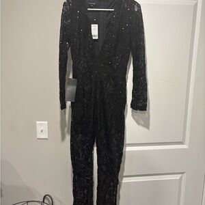Bebe SPARKLE LACE KNIT CATSUIT Size Small